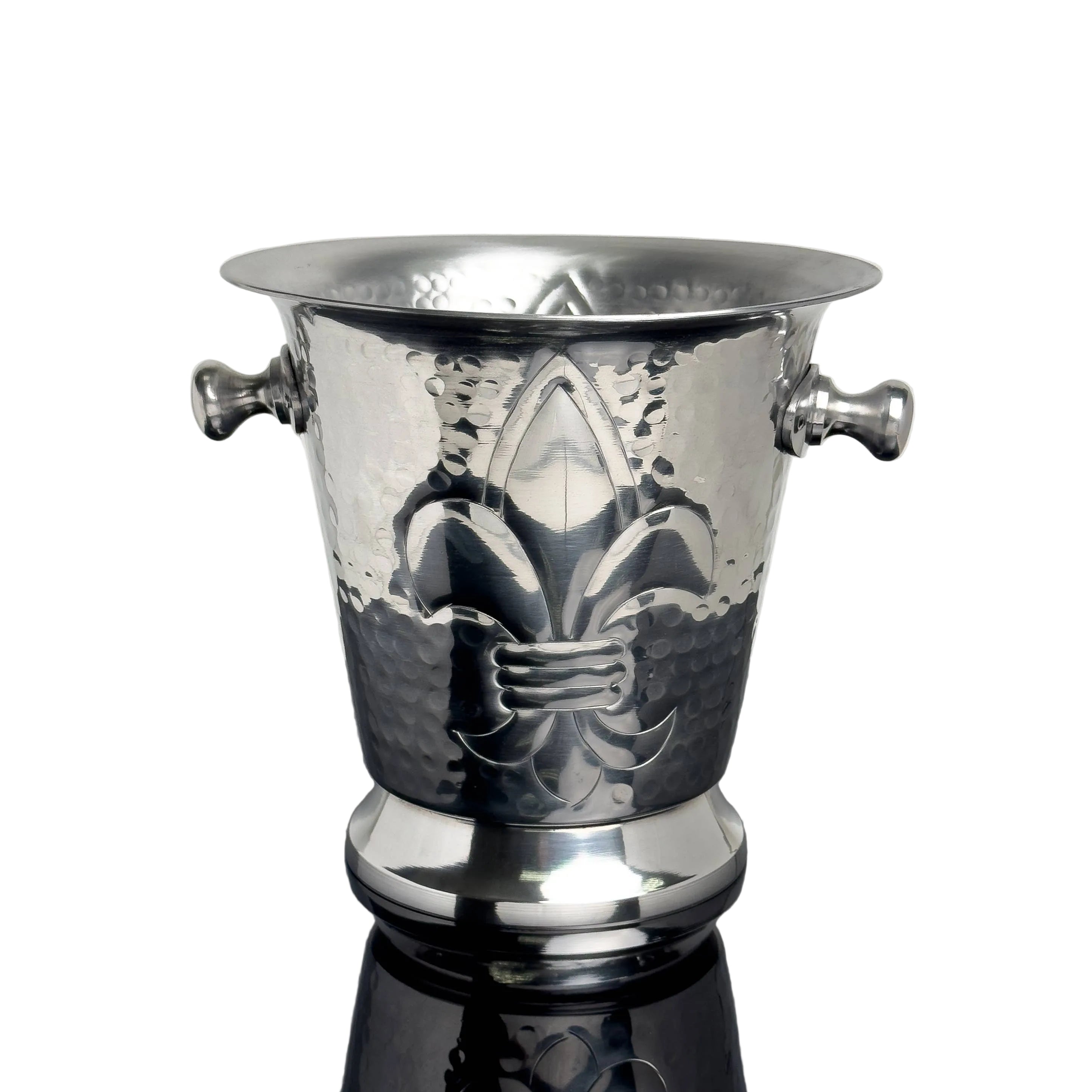 Silver wine cooler with fleur-de-lis design on a reflective surface