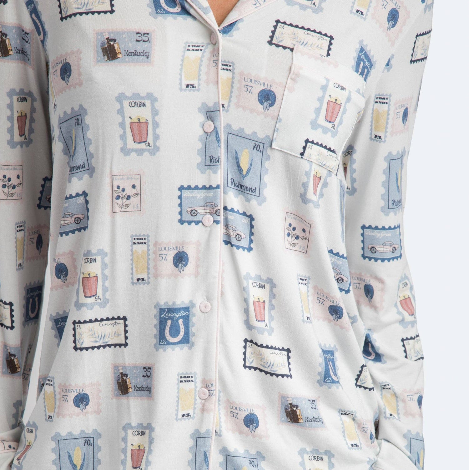 Patterned pajama set with cartoon-like illustrations on a white background
