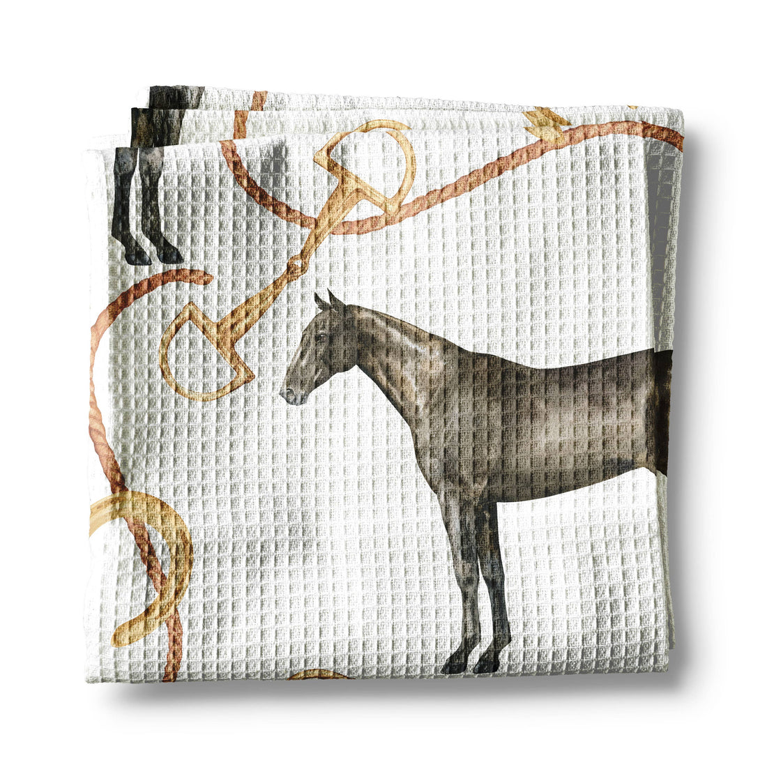 Folded fabric with horse and bridle pattern on a white background