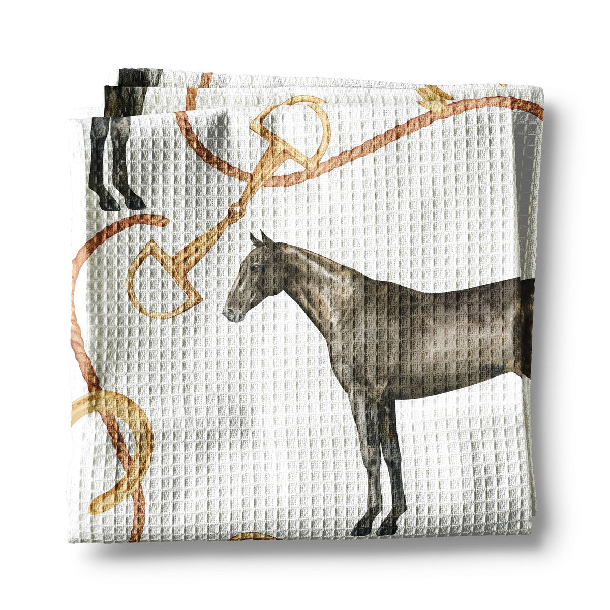 Folded fabric with horse and bridle pattern on a white background