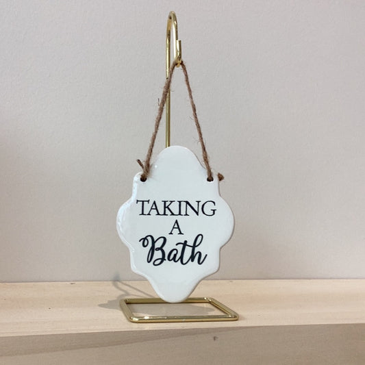 “Taking a Bath” Glass Sign