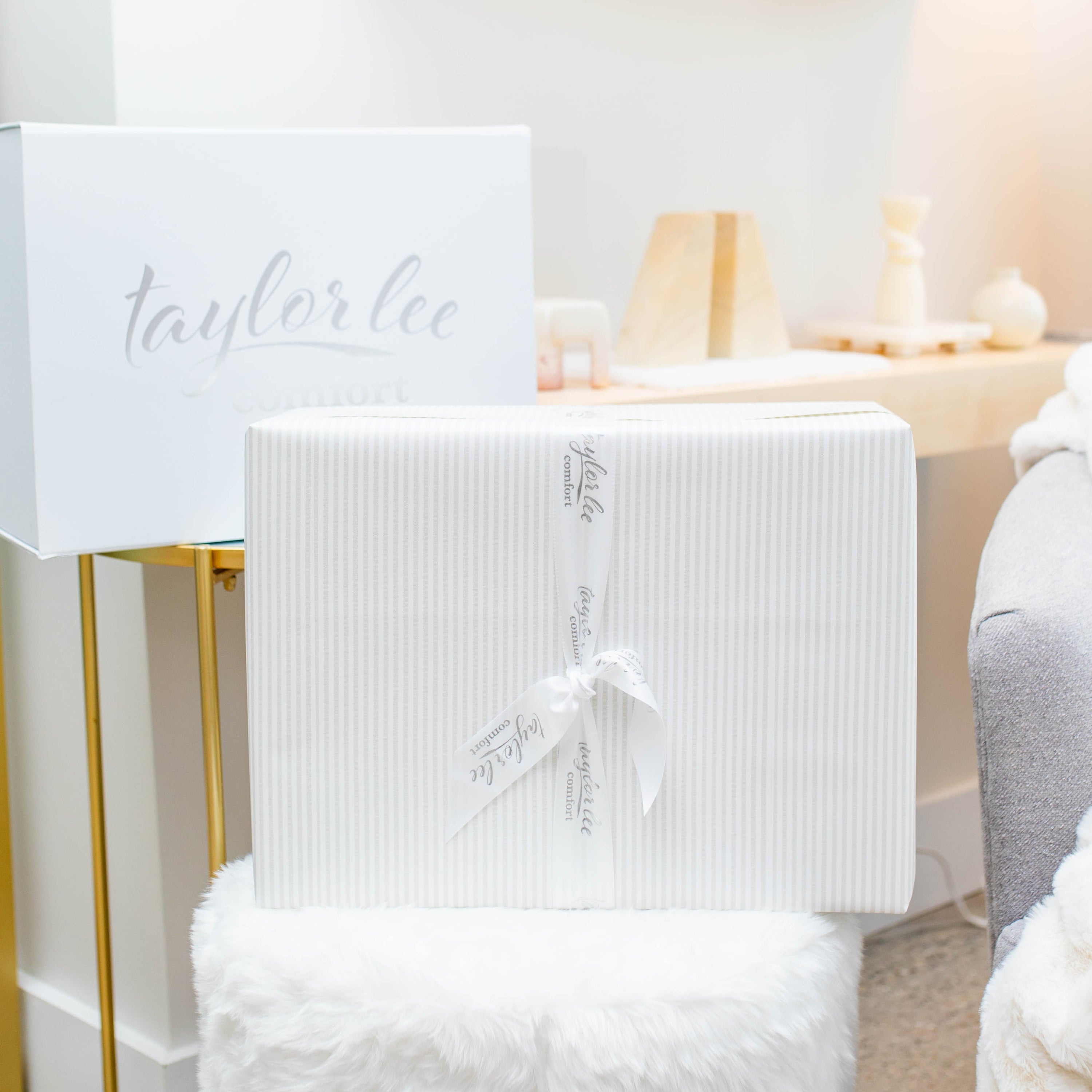 White chair with a fluffy cover in a room setting