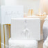 White chair with a fluffy cover in a room setting
