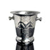 Silver wine cooler with fleur-de-lis design on a reflective surface